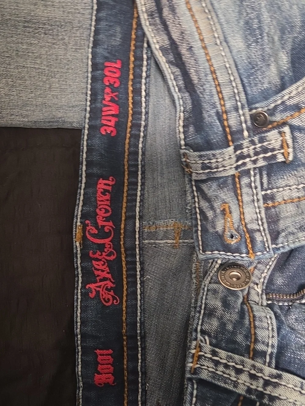 Slim Straight Men's Blue Jeans with Red Embroidered Waistband